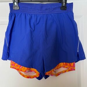 Fabletics Blue and Orange Athletic Perforated Run 2” shorts